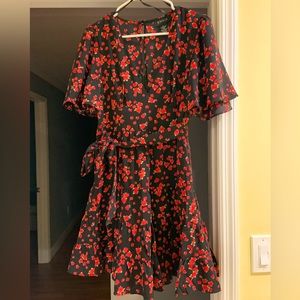 Floral dress only worn once but looked too short on me bc Im large size is 6-8